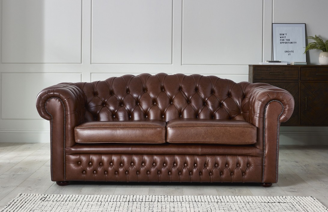 aged leather sofa bed